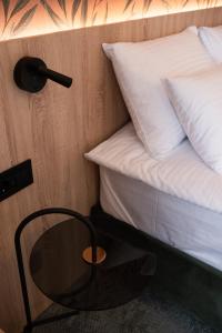 Postel nebo postele na pokoji v ubytování HOTEL GRACIAN