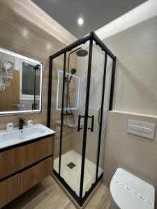 a bathroom with a shower and a sink at Hostal Alogar in Barcelona +36 photos