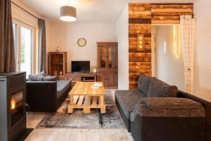 TV a/nebo společenská místnost v ubytování Chalet Novablick