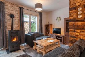 TV a/nebo společenská místnost v ubytování Chalet Novablick