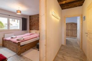 Postel nebo postele na pokoji v ubytování Chalet Novablick