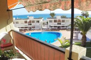The swimming pool at or close to Vera Mar 9C - Primera linea con Parking y TV Sat