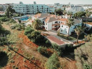 an aerial view of a house in a city at Casa Velha Apartments - Adults friendly in Albufeira
