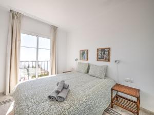 Posteľ alebo postele v izbe v ubytovaní Amazing villa with magical view and pool in Nerja + 37 fotografií