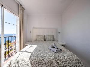 Posteľ alebo postele v izbe v ubytovaní Amazing villa with magical view and pool in Nerja