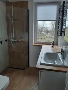 Fotografia z galérie ubytovania Apartament – 3 pokojowe dwupoziomowe mieszkanie z ogrodem v destinácii Krokowa + 26 fotografií