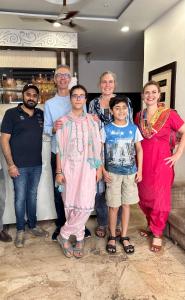 a group of people posing for a picture at Hotel Kabir Residency in Amritsar