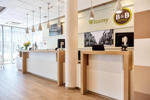 a view of the waiting area of a wyther office at B&B Hotel Łódź Centrum in Łódź
