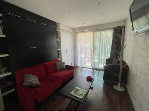 Area soggiorno di Studio tout confort au calme avec jardin proche Cannes