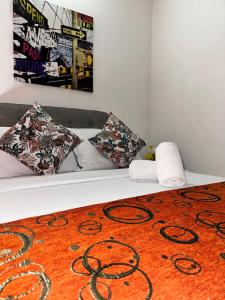 Cama o camas de una habitación en SGH hotel Mathilu Rodadero