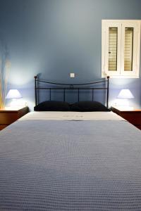 Tempat tidur dalam kamar di Vetsa's Experience