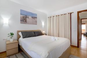 Posteľ alebo postele v izbe v ubytovaní Casa Las Palmeras + 17 fotografií