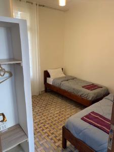 Postel nebo postele na pokoji v ubytování AFRIC HOTEL- Casbah