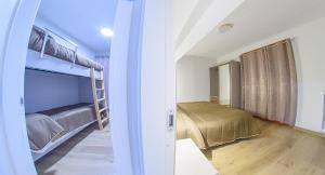 A bed or beds in a room at Grand Hotel Europa Rivisondoli Centro
