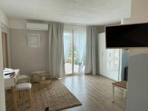 TV a/nebo společenská místnost v ubytování La Pecora Nera B&B