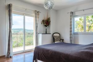Posteľ alebo postele v izbe v ubytovaní Villa Denis Completa + 20 fotografií