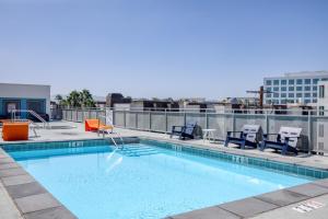 a swimming pool on the roof of a building at N Hollywood 1BR w Pool Gym nr shops LAX-529 in Los Angeles