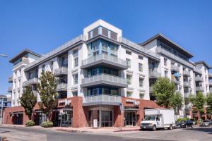 an apartment building on a street with a truck parked in front at N Hollywood 1BR w Pool Gym nr shops LAX-529 in Los Angeles