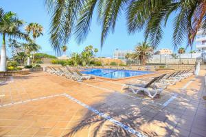 Bazén v ubytovaní MICHELE APARTMENT PLAYA DE LAS AMÉRICAS alebo v jeho blízkosti