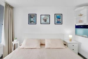 Posteľ alebo postele v izbe v ubytovaní MICHELE APARTMENT PLAYA DE LAS AMÉRICAS
