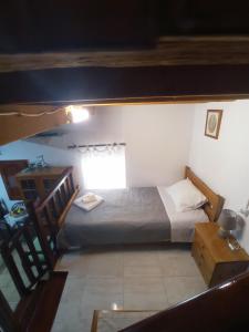 Postel nebo postele na pokoji v ubytování Vaggelitsa's House