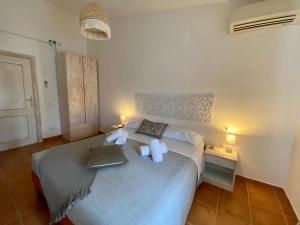 Postel nebo postele na pokoji v ubytování B&B La Pitraia