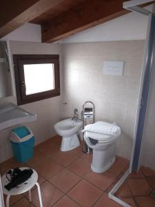 Koupelna v ubytování Agriturismo L'Ulivo + 37 fotografií