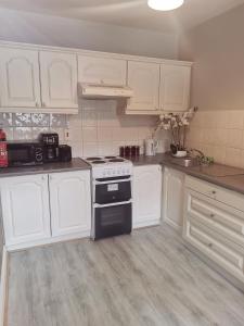 Küche/Küchenzeile in der Unterkunft 360 Town Stay Apartments & Studios
