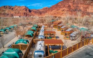 an aerial view of a restaurant with a mountain in the background at Sun Outdoors Arches Gateway in Moab