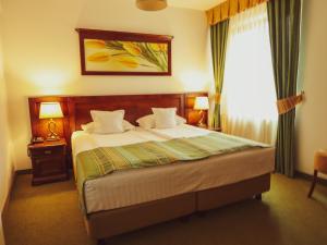 Postel nebo postele na pokoji v ubytování Hotel Residenz