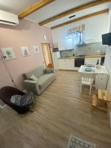 TV a/nebo společenská místnost v ubytování Casa di Mila