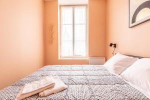 Posteľ alebo postele v izbe v ubytovaní Cosy F3 Lamartine 102 Coeur-Centre
