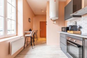 Kuchyňa alebo kuchynka v ubytovaní Cosy F3 Lamartine 102 Coeur-Centre
