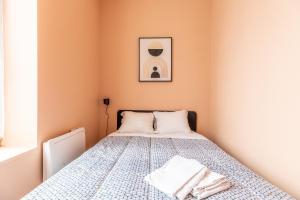 Posteľ alebo postele v izbe v ubytovaní Cosy F3 Lamartine 102 Coeur-Centre