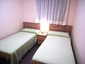 Posteľ alebo postele v izbe v ubytovaní Edificio Papa Luna