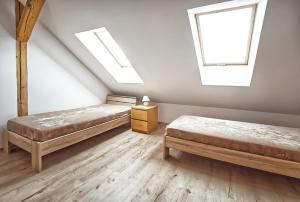 A bed or beds in a room at Nice accommodation in Mikulov