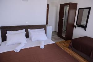 Llit o llits en una habitació de MS Hotel