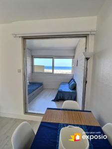 Postel nebo postele na pokoji v ubytování LA CABANE DE LA MER