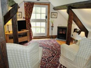 Posezení v ubytování Shamrock Cottage