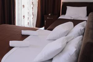 Llit o llits en una habitació de MS Hotel