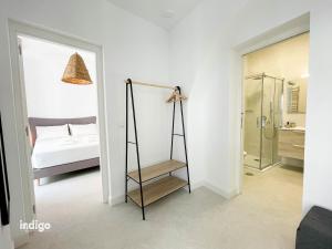 Kúpeľňa v ubytovaní Casa Cristóbal Colón habitaciones con vistas a Semana Santa y Fiestas