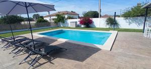 Bazén v ubytovaní Casa La Cabaña alebo v jeho blízkosti