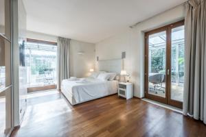 Ένα ή περισσότερα κρεβάτια σε δωμάτιο στο Nicola's Penthouse +45 φωτογραφίες