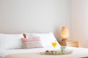 Postel nebo postele na pokoji v ubytování Alegria Boutique Villas
