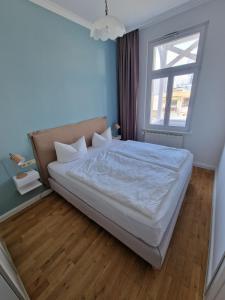 Postel nebo postele na pokoji v ubytování Villa Alba