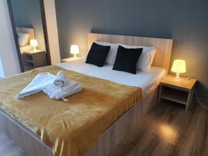 Un pat sau paturi într-o cameră la Apartment Villa