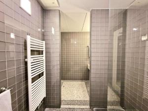 Koupelna v ubytování Roccobarocco Boutique Hotel + 37 fotografií