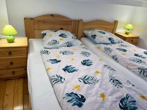 Posteľ alebo postele v izbe v ubytovaní Vito Apartman