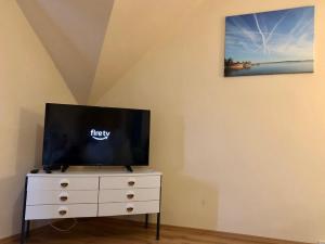 Televízia a/alebo spoločenská miestnosť v ubytovaní Casa Galliera - Apartment