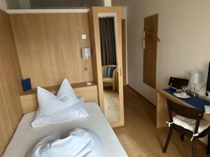 Letto o letti in una camera di Hotel Kendler
